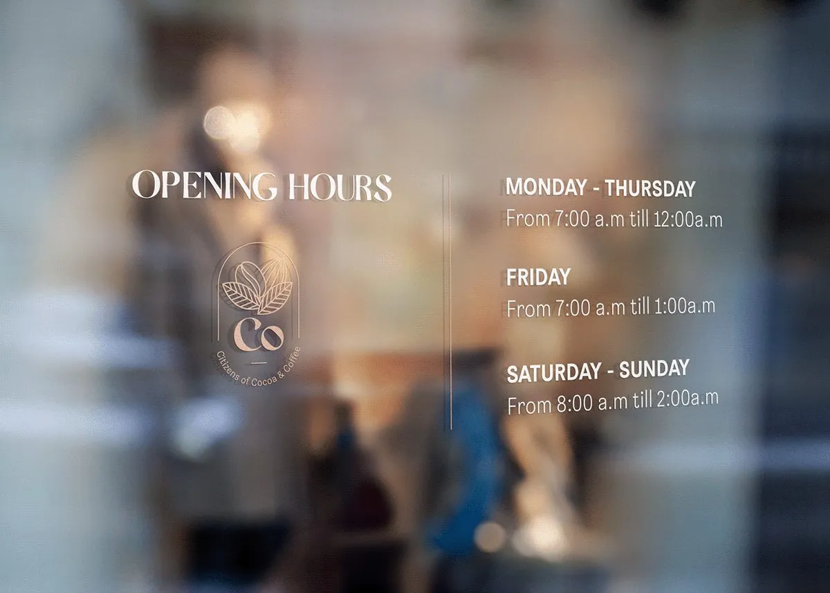 Cocoffee window graphics with opening hours